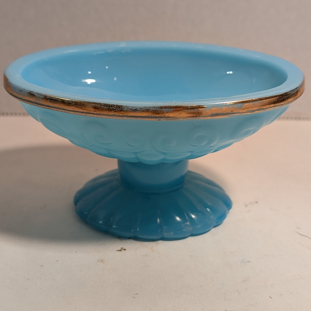 A vintage Avon Bristol Blue Collection opaline glass soap dish with gold trim. l